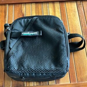 Vintage Case Logic Portable CD/gamer carrying case with strap.​